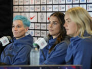 From left, Megan Rapinoe, Alex Morgan, and Lindsey Horan speak to reporters during the 2023 Women's World Cup media day for the United States Women's National Team in Carson, Tuesday, June 27, 2023.