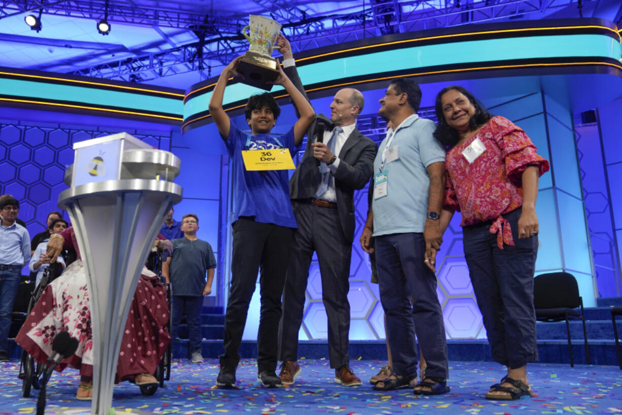 Dev Shah, 14, from Largo, Fla., celebrates winning the Scripps National Spelling Bee alongside his family, Thursday, June 1, 2023, in Oxon Hill, Md.