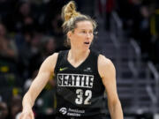 Seattle Storm guard Sami Whitcomb looks on during the first half of a WNBA basketball game against the Washington Mystics, Sunday, June 11, 2023, in Seattle.