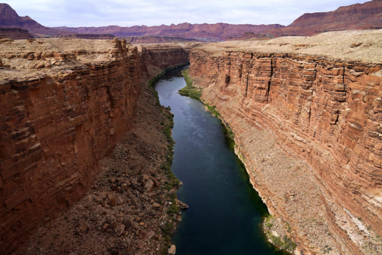FILE - The Colorado River in the upper River Basin is pictured in Lees Ferry, Ariz., on May 29, 2021.  (AP Photo/Ross D.