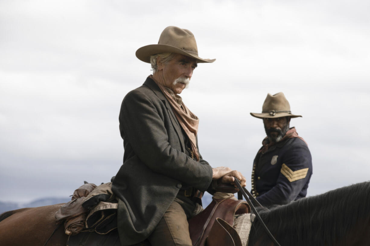 Sam Elliott, center, and LaMonica Garrett in a scene from "1883." (Emerson Miller/Paramount+)