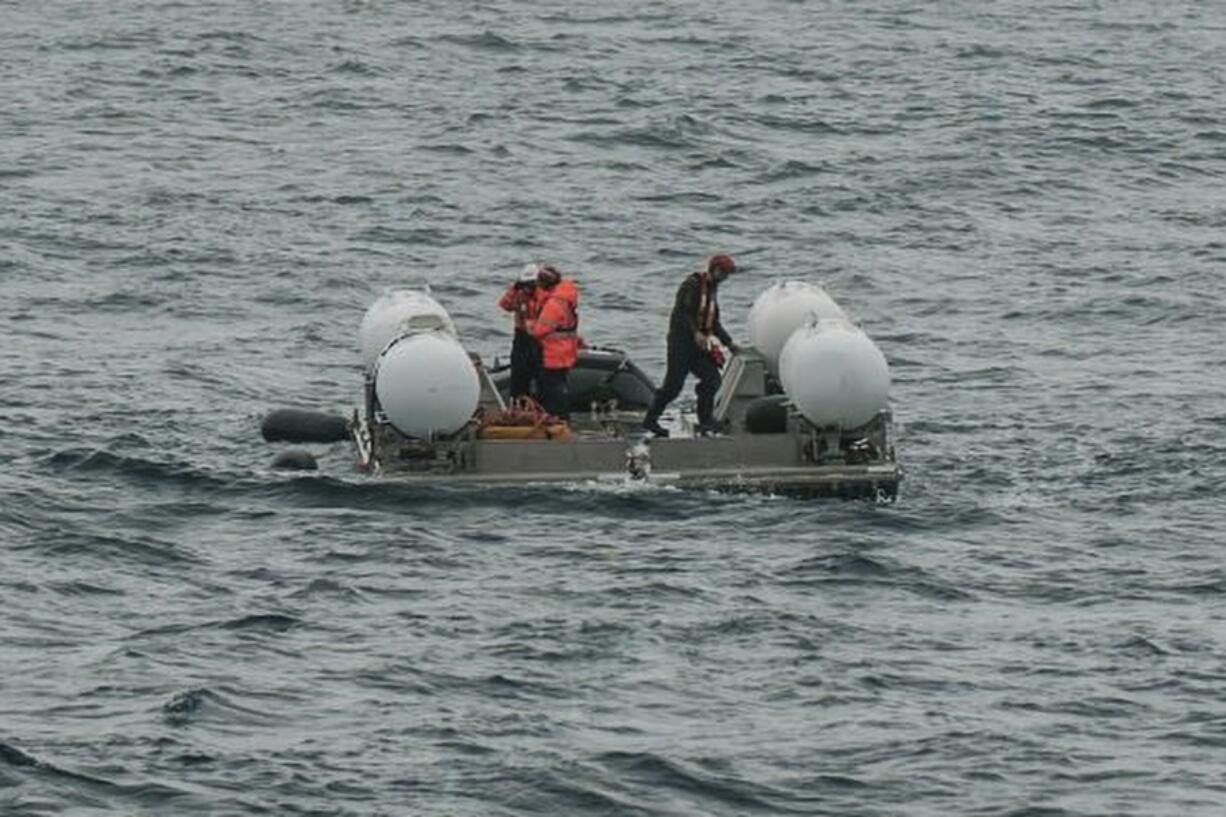 In this photo released by Action Aviation, the submersible Titan is prepared for a dive into a remote area of the Atlantic Ocean on an expedition to the Titanic on Sunday, June 18, 2023. Rescuers raced against time Tuesday, June 20, to find the missing submersible carrying five people, who were reported overdue Sunday night.