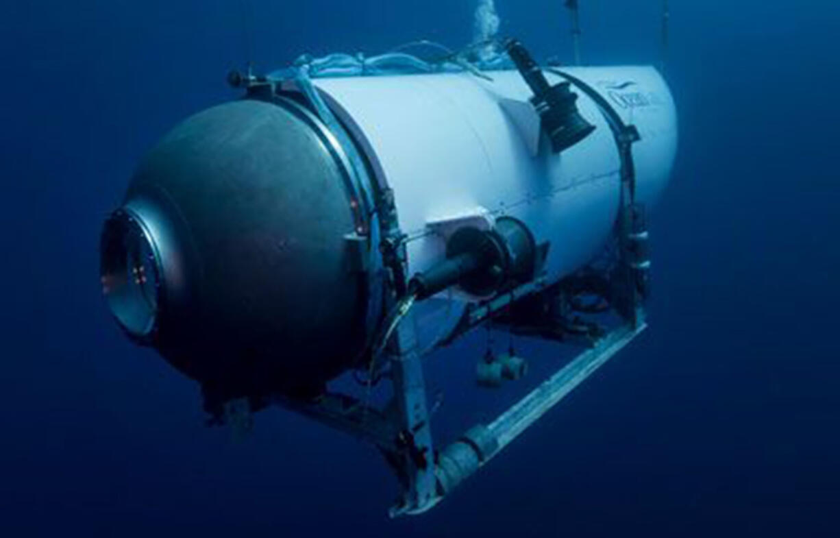 FILE - This undated image provided by OceanGate Expeditions in June 2021 shows the company's Titan submersible. The wrecks of the Titanic and the Titan sit on the ocean floor, separated by 1,600 feet (490 meters) and 111 years of history. How they came together unfolded over an intense week that raised temporary hopes and left lingering questions.