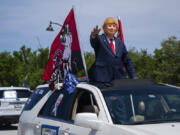 Supporters of former President Donald Trump gather outside Mar-A-Lago, Sunday, June 11, 2023, in Palm Beach, Fla.