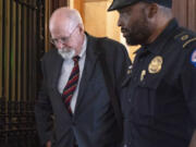 Special Counsel John Durham leaves a closed hearing of the Permanent Select Committee on Intelligence, Tuesday, June 20, 2023, on Capitol Hill in Washington.