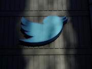 FILE - A sign at Twitter headquarters is shown in San Francisco on Nov. 18, 2022. The Los Angeles District Attorney has left Twitter due to barrage of "vicious" homophobic attacks that were not removed by the social media platform even after they were reported, the office confirmed on Thursday, June 8, 2023.