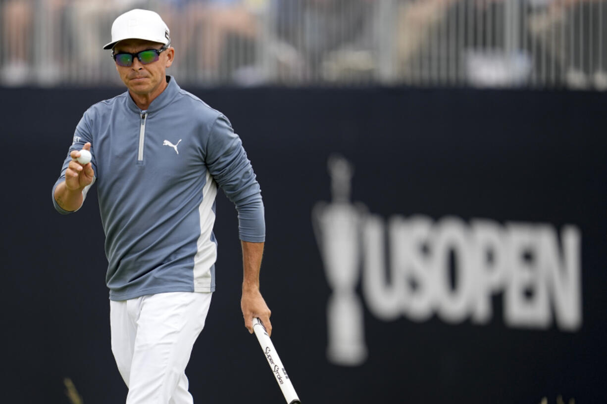 Rickie Fowler waves after setting scoring record with a 62 in the first round of the U.S. Open golf tournament at Los Angeles Country Club on Thursday, June 15, 2023, in Los Angeles.