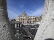 FILE - A view of the Palm Sunday's mass celebrated by Pope Francis in St. Peter's Square at The Vatican on April 2, 2023. The Vatican on Friday, June 30, 2023  reported a doubling of income from its key Peter's Pence charitable fund last year, to 107 million euros, even as donations from the rank and file faithful dipped slightly following years of scandal over financial mismanagement at the Holy See.