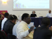 Sister Nathalie Becquart, right, the first female undersecretary in the Vatican's Synod of Bishops, gives a lesson to a religion male congregation in Sacrofano, near Rome, Monday, June 5, 2023. Becquart is charting the global church through an unprecedented, and even stormy, period of reform as one of the highest-ranking women at the Vatican.