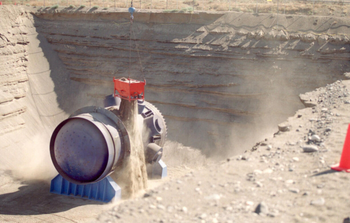 The decommissioned reactor vessel from Portland General Electric’s Trojan Nuclear Power Station in Oregon is buried in 1999 at the Hanford Nuclear Reservation near Richland. (Associated Press files)