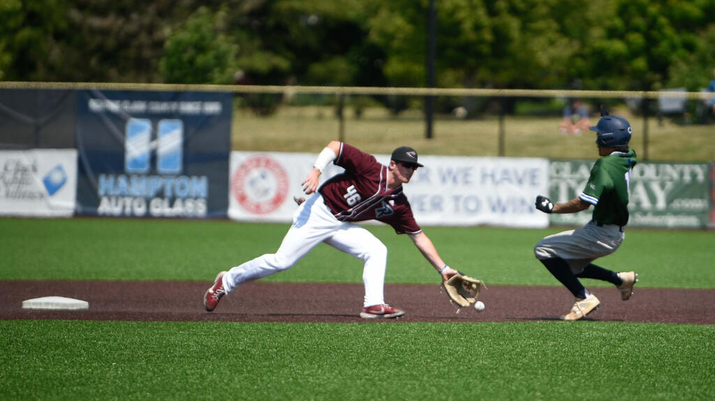 Ridgefield's Jackson Nicklaus, left, tries to snag a throw from home plate during a steal attempt from Portland's Xiage Lancaster on Tuesday, July 4, 2023, at Ridgefield Outdoor Recreation Complex.