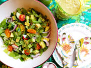 This piquant summer salad blends crunchy fresh veggies with creamy avocado and a tangy avocado dressing.