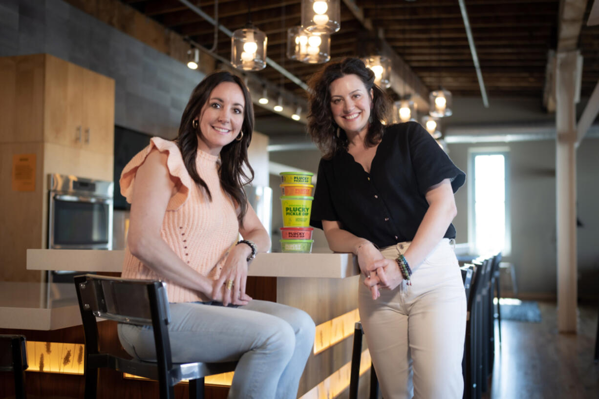 Sara Doherty and Britt Jungerberg are co-founders of Plucky Pickle Dip, shown here on April 26 in Minneapolis, Minn.