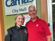 New Camas Police Chief Tina Jones stands outside Camas City Hall with retiring Camas Police Chief Mitch Lackey earlier this month.