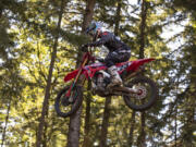 Chase Sexton catches air in the 450 Class Moto #2 at the Washougal National Lucas Oil Pro Motocross Championships at the Washougal MX Park on Saturday afternoon, July 23, 2022.