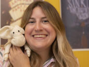 Amanda Schwarz, 27, of East Passyunk and her favorite stuffed animal, a pig named Paul. (Jose F.