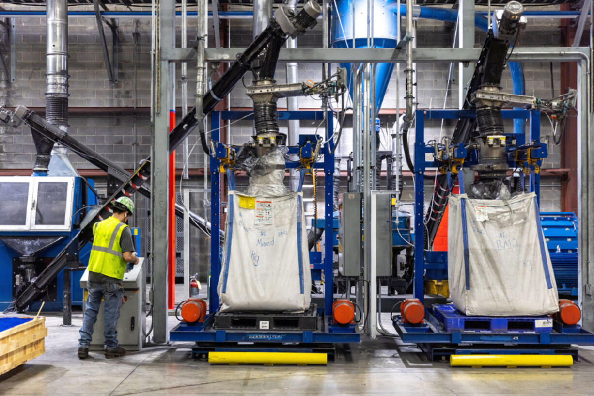 A worker is seen in Ascend Elements??? facility in Covington on Tuesday, March 28, 2023. The lithium-ion battery recycling plant is holding an opening ceremony on Wednesday for the public and press.