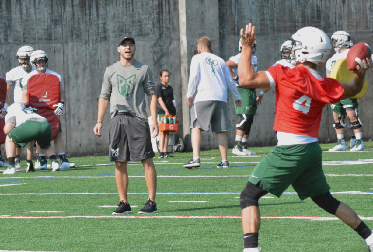 Parker Henry got his start in college coaching by volunteering at Portland State practices in 2018. He was hired Monday, July 31, 2023, as the Vikings? linebackers coach and special teams coordinator.