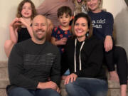 2011 Washougal High School graduate Jesse Revesz (top center) and former Washougal High counselor Christina Mackey-Greene (bottom right) gather with their families earlier this year.