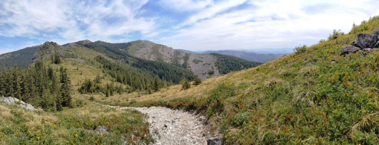 A side trail along the Grouse Vista Trail leads up a slope where you can take in this view of Pyramid Rock, the peak of Silver Star Mountain and far-distant ridges to the southeast.