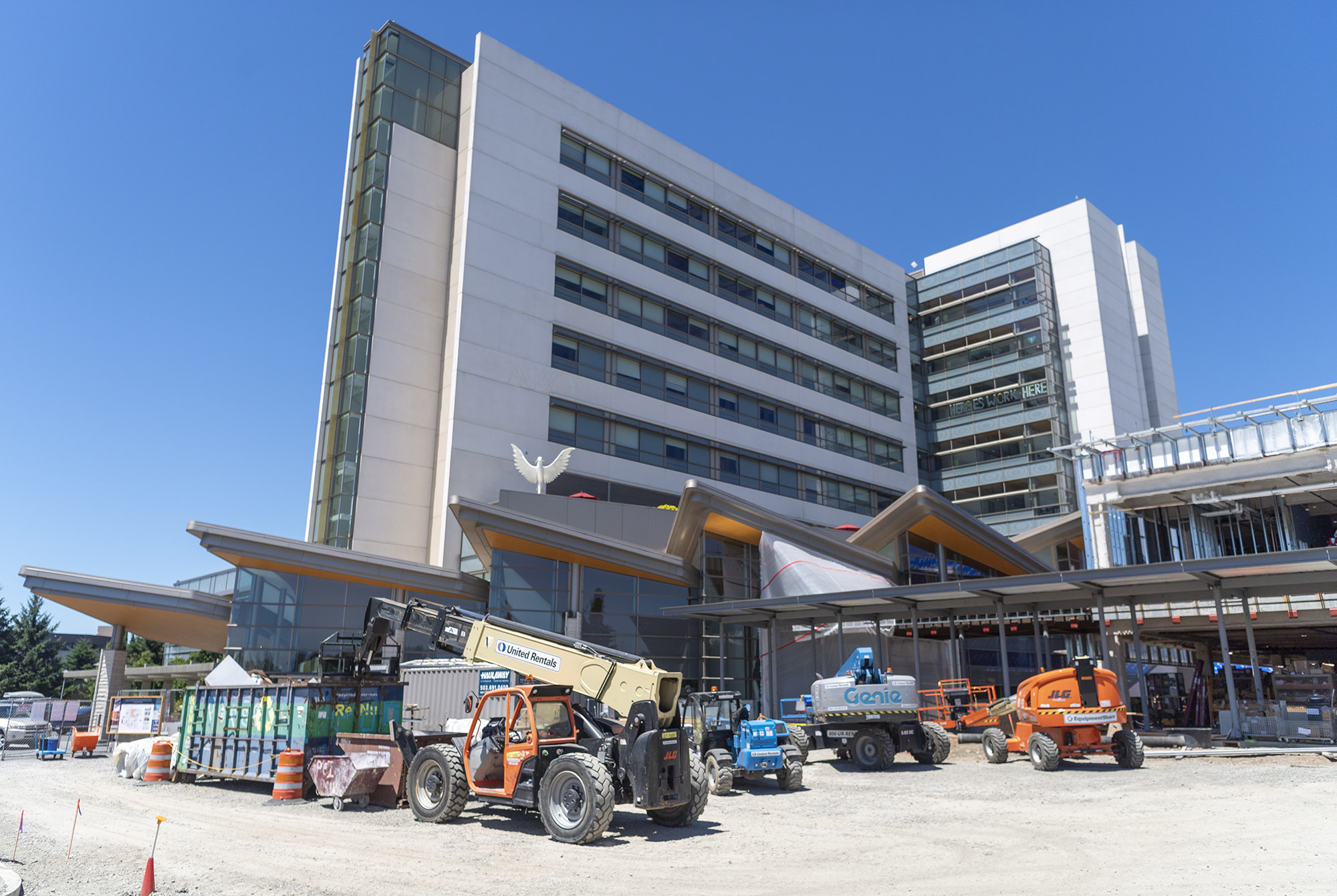 Construction vehicles sit in front of the Firstenburg Tower on Friday, June 30, 2023, at PeaceHealth Southwest Medical Center. The expanded emergency department is expected to open on time in 2024.