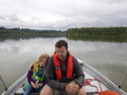 Marlow Bullis, 6, rests on the shoulder of her dad, Vancouver Rowing Club coach Conor Bullis, while on a boat tour.