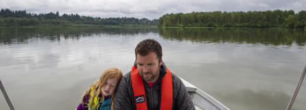Marlow Bullis, 6, rests on the shoulder of her dad, Vancouver Rowing Club coach Conor Bullis, while on a boat tour.