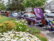 The 15th annual Touchmark at Fairway Village Car and Music Festival raised more than $12,000 for the Alzheimer's Association and Parkinson's Resources of Oregon.