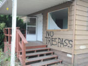 No trespassing signs warn visitors not to enter the old caretaker residence at Daybreak Regional Park. The home and an outbuilding are slated for demolition later in the week.