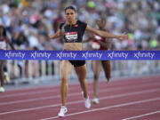 Sydney McLaughlin-Levrone crosses the finish line to win the women's 400 meter final during the U.S. track and field championships in Eugene, Ore., Saturday, July 8, 2023.