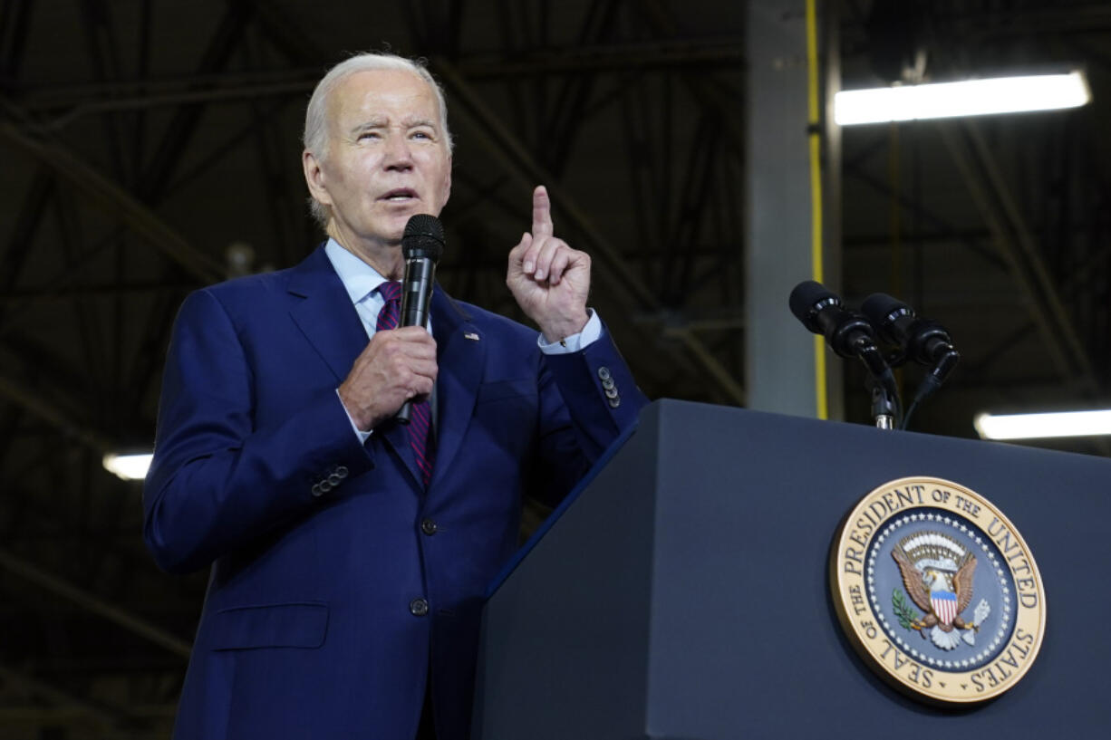 President Joe Biden speaks at Auburn Manufacturing Inc., in Auburn, Maine, Friday, July 28, 2023, before he signs an executive order to encourage companies to manufacture new inventions in the United States.