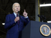 President Joe Biden speaks at Auburn Manufacturing Inc., in Auburn, Maine, Friday, July 28, 2023, before he signs an executive order to encourage companies to manufacture new inventions in the United States.