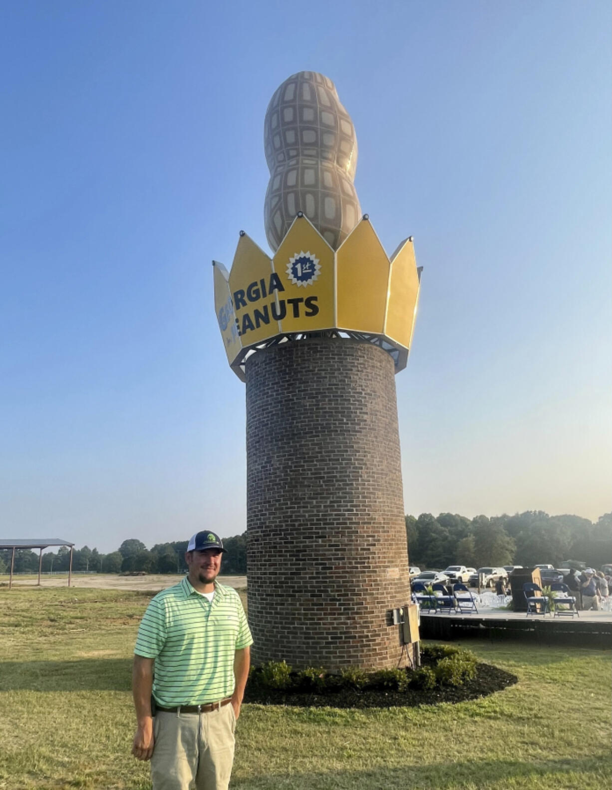 Cole Sercer of Sercer Machine & Fabrication, standing beside the Big Peanut that he and his employees designed and built near Interstate 75 in Ashburn, Ga.