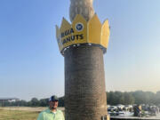 Cole Sercer of Sercer Machine & Fabrication, standing beside the Big Peanut that he and his employees designed and built near Interstate 75 in Ashburn, Ga.