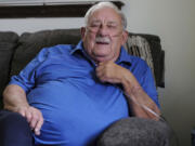 Retired coal miner James Bounds, who has pneumoconiosis, more commonly known as "black lung," poses for a photo at his home in Oak Hill, W.Va., Thursday, July, 13, 2023. Bounds said nothing can be done to reverse the debilitating illness he was diagnosed with at 37 in 1984. But he doesn't want others to suffer the same fate.