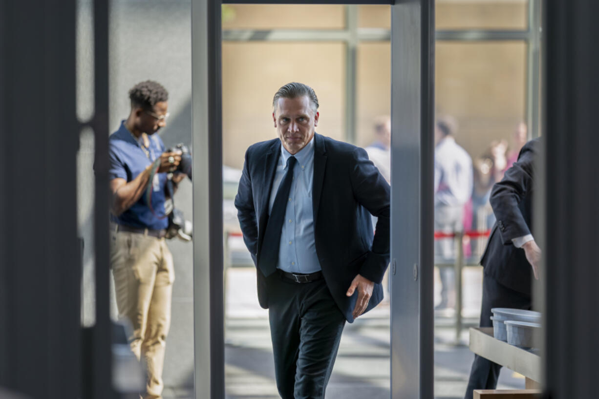 Devon Archer, Hunter Biden's former business partner, passes through the security checkpoint as he arrives on Capitol Hill to give closed-door testimony to the House Oversight Committee in the Republican-led investigations into the son of President Joe Biden, in Washington, Monday, July 31, 2023. (AP Photo/J.