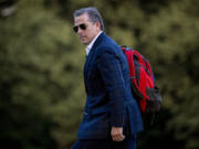 FILE - Hunter Biden, the son of President Joe Biden, walks from Marine One upon arrival at Fort McNair, June 25, 2023, in Washington. The Republican chairmen of three key House committees are joining forces to probe the Justice Department's handling of charges against Hunter Biden after making sweeping claims about misconduct at the agency.