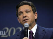 FILE - Republican presidential candidate Florida Gov. Ron DeSantis speaks during the Family Leadership Summit, July 14, 2023, in Des Moines, Iowa.  DeSantis was in a car accident Tuesday as he traveled to presidential campaign events in Tennessee but wasn't injured, his campaign says.