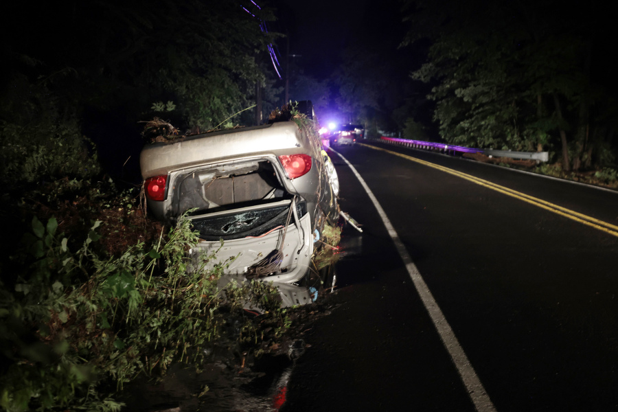 One of the cars that was swept up in flooding that occurred on Washington Crossing Rd., near Houghs Creek, in the Washington Crossing, Pa. area on Sat. July 15, 2023. Several people were killed when torrential rains in area cause fast rising floodwaters washing away cars.