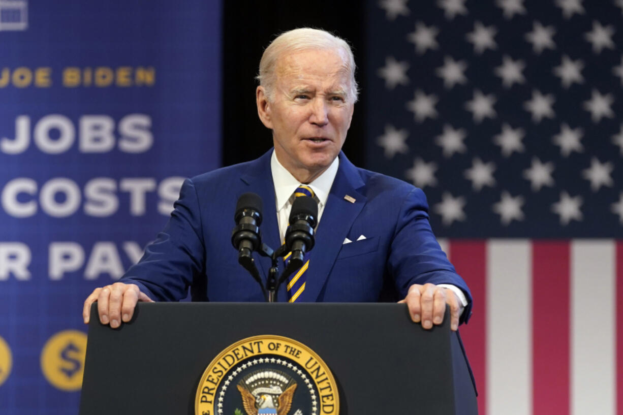 FILE - President Joe Biden speaks about the economy to union members at the IBEW Local Union 26, Feb. 15, 2023, in Lanham, Md. As he runs for a second term, President Joe Biden has made progress wooing his party's left wing. Many progressives have cheered steep federal spending increases on major social programs and green energy, and the president's new attempts to offer student debt relief after the Supreme Court struck down his original efforts to do so.