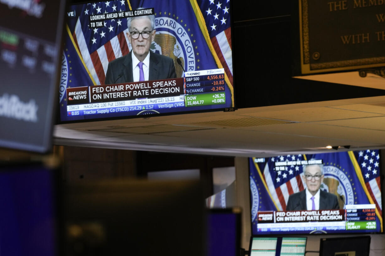 Federal Reserve Chairman Jerome Powell's news conference is displayed on a monitor on the floor at the New York Stock Exchange in New York, Wednesday, July 26, 2023. Stocks are mixed after the Federal Reserve followed through on Wall Street's expectations and raised its benchmark interest rate to its highest level in more than two decades.