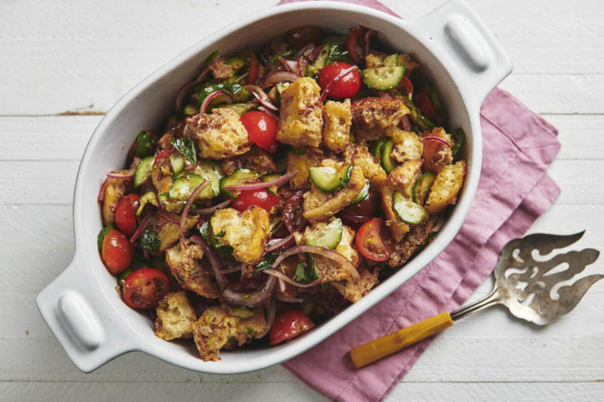 This image shows a recipe for tomato panzanella salad. The classic Tuscan salad was originally created to use up stale bread.