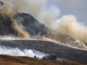 The San Antonio Fire spreads uphill west of Petaluma, Ca., Friday, June 30, 2023. The entire planet sweltered for the two unofficial hottest days in human recordkeeping Monday and Tuesday, according to University of Maine scientists at the Climate Reanalyzer project. The unofficial heat records come after months of unusually hot conditions due to climate change and a strong El Nino event.