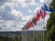 Flags of NATO member countries flap in the wind outside the venue of the NATO summit in Vilnius, Lithuania, Sunday, July 9, 2023. Russia's war on Ukraine will top the agenda when U.S. President Joe Biden and his NATO counterparts meet in the Lithuanian capital Vilnius on Tuesday and Wednesday.