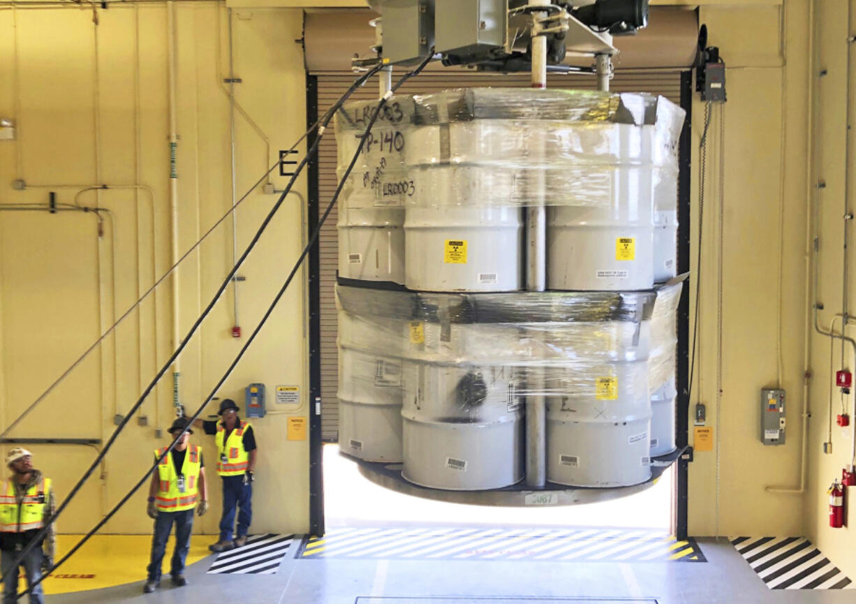 Barrels of radioactive waste are loaded for transport from the Radioactive Assay Nondestructive Testing facility in Los Alamos, N.M., to the Waste Isolation Pilot Plant in 2019. Officials hosted a forum Thursday in Los Alamos to talk about the ongoing cleanup of the site.