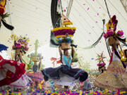 Dancers perform July 17 on the first day of the Guelaguetza in Oaxaca, Mexico. During the government-sponsored event, 16 Indigenous ethnic groups and the Afro-Mexican community promote their traditions through dances, parades and craft sales.