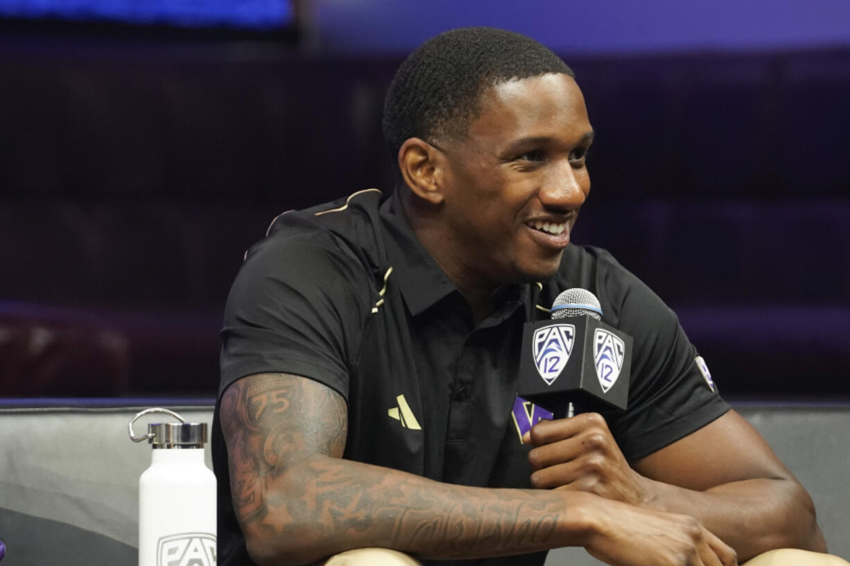 Washington quarterback Michael Penix Jr. smiles at the Pac-12 media day Friday in Las Vegas.