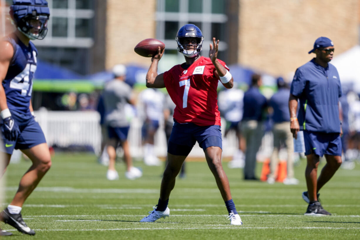 Seattle Seahawks quarterback Geno Smith (7) looks to throw during the NFL football team's training camp, Wednesday, July 26, 2023, in Renton, Wash.