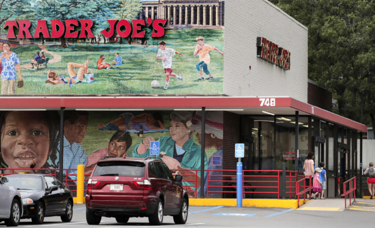 FILE - Customers walk to a Trader Joe's market, Aug. 13, 2019, in Cambridge, Mass. Trader Joe's is recalling two of its cookie products because they may contain rocks, the grocery chain announced Friday, July 21, 2023.