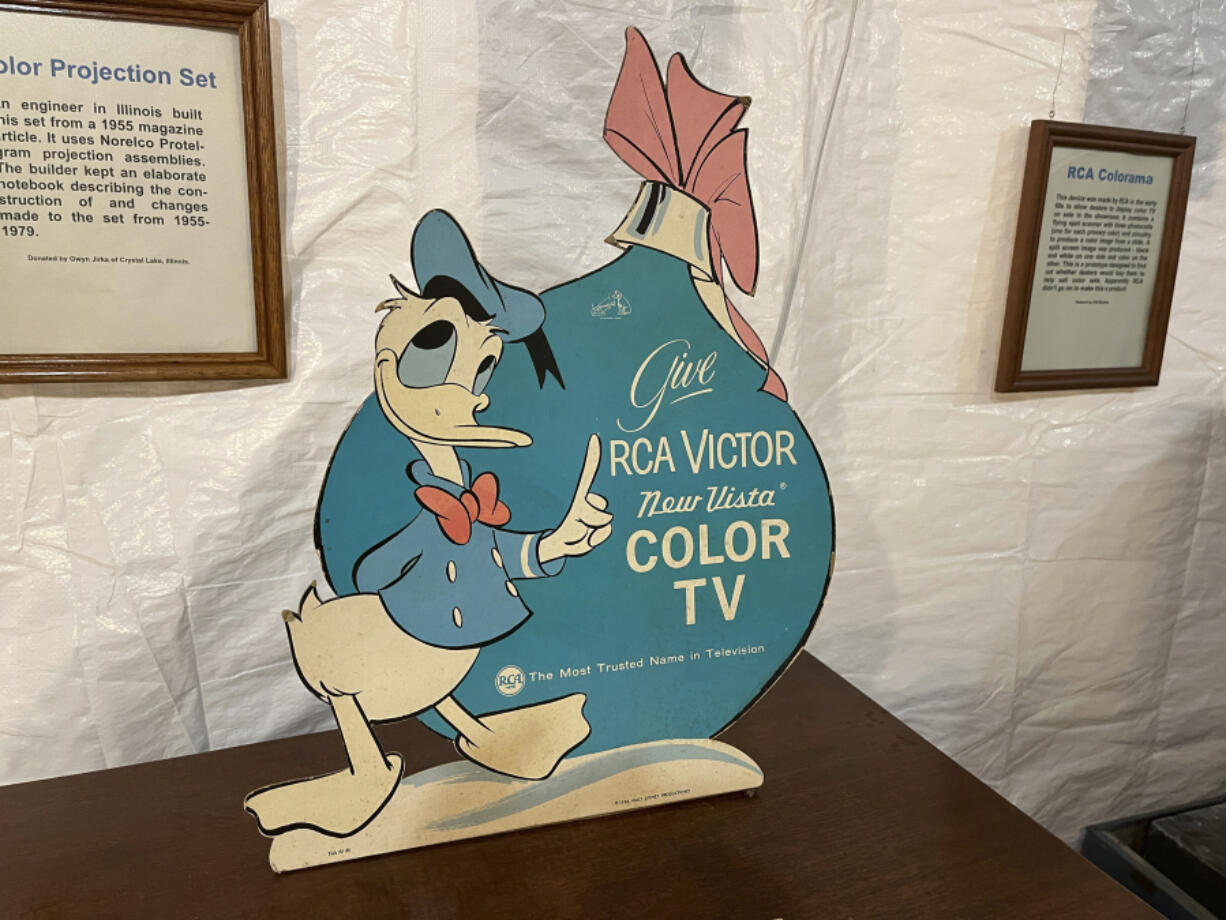 An advertisement featuring Donald Duck appears among the collection of televisions June 4 at the Early Television Museum in Hilliard, Ohio.